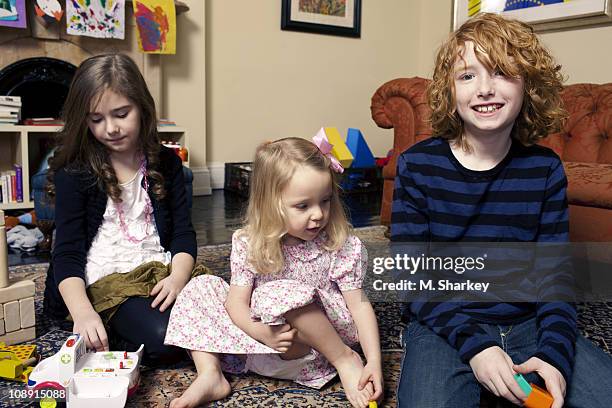 Author Andrew Solomon's extended family: Lucy Scher, Carolyn Blaine Smith Solomon and Oliver Scher pose at a portrait session for Newsweek on January...