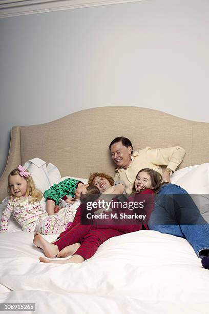 Author Andrew Solomon and extended family: Carolyn Blaine Smith Solomon, George Charles Habich Solomon, Oliver Scher, and Lucy Scher pose at a...