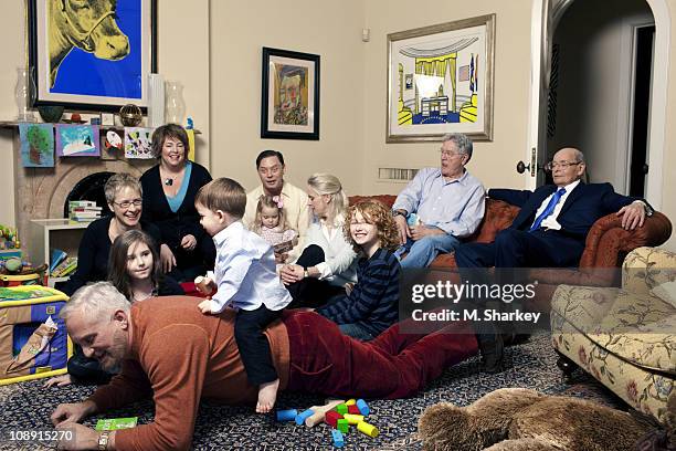 Author Andrew Solomon and extended family: clockwise from top left: Tammy Ward, Laura Scher, Andrew holding daughter Carolyn Blaine Smith Solomon,...
