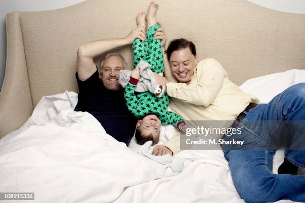 Author Andrew Solomon, husband John Habich and son George Charles Habich Solomon pose at a portrait session for Newsweek on January 17, 2011 in New...