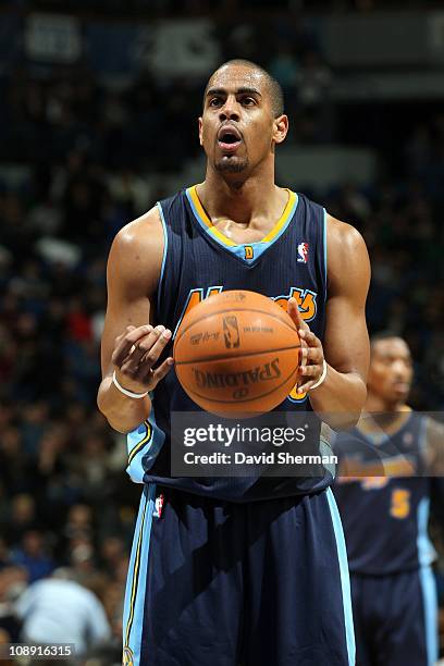 Arron Afflalo of the Denver Nuggets prepares to shoot a free throw against the Minnesota Timberwolves during a game on February 5, 2011 at the Target...