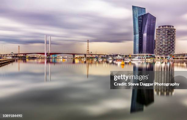 melbourne docklands reflections - melbourne docklands stock pictures, royalty-free photos & images