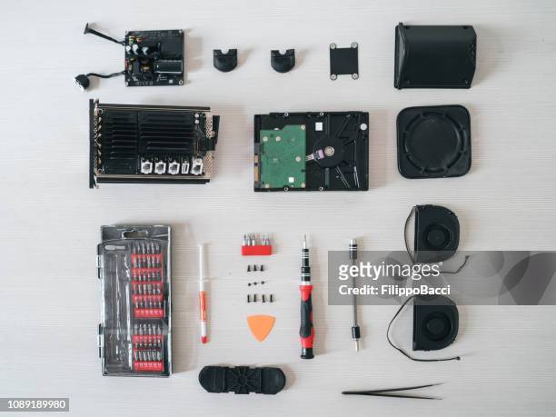 disassembled electronic device on the table - knolling tools stock pictures, royalty-free photos & images