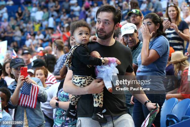 Serena Williams' husband Alexis Ohanian, carries their daughter Alexis Olympia Ohanian Jr. From the team box following the women's singles match...