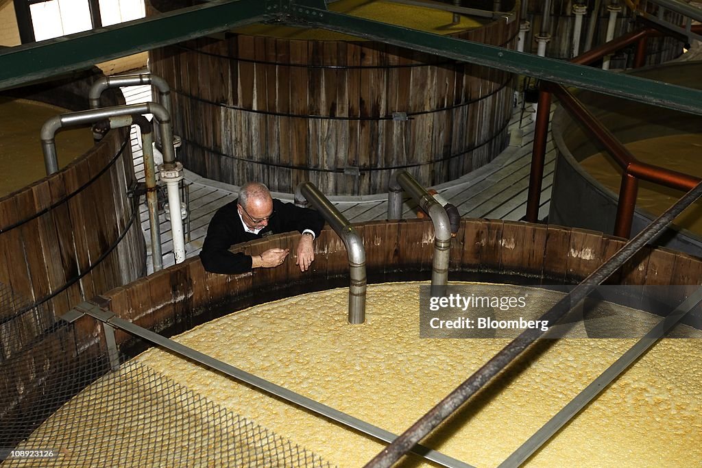 Jim Rutledge Four Roses Jim Rutledge, master distiller for Four Roses Distillery LLC, checks ...