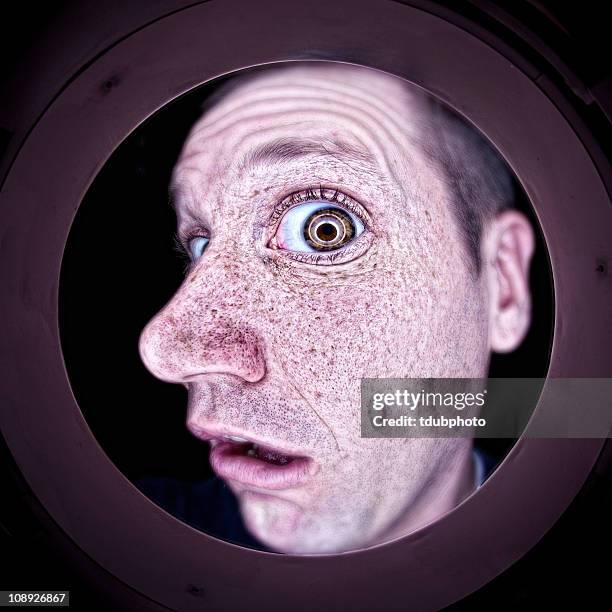 peephole - looking through hole stock pictures, royalty-free photos & images