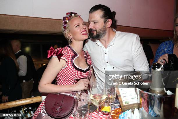 Franziska Knuppe and her husband Christian Moestl during the 28th Weisswurstparty at Hotel Stanglwirt on January 25, 2019 in Going near Kitzbuehel,...