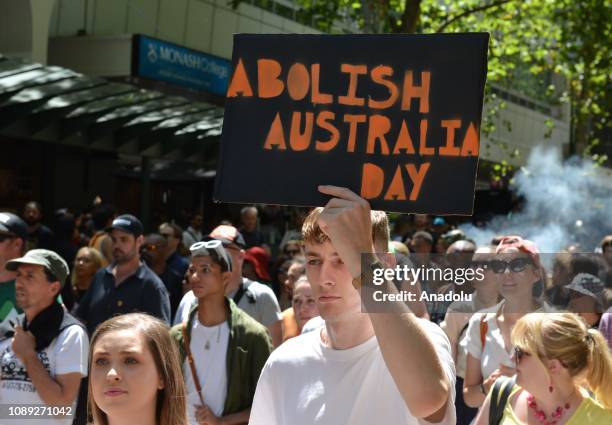 Australian Aborigines and their supporters stage a protest against Australia Day, which was the day the first fleet pulled into Sydney Cove and...