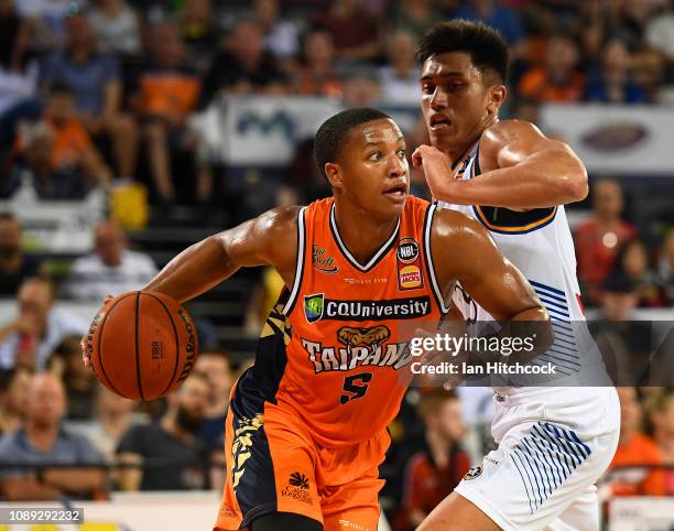 Devon Hall of the Taipans drives to the basket during the round 12 NBL match between the Cairns Taipans and the Brisbane Bullets at Cairns Convention...