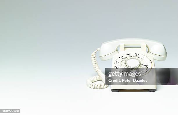 white phone on white background with copy space - teléfono con cable fotografías e imágenes de stock