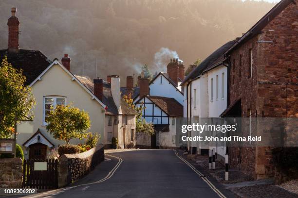 england, somerset - dunster village - english village stock pictures, royalty-free photos & images