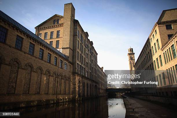 The Leeds & Liverpool Canal runs alongside the Saltaire Village World Heritage Site in Bradford, West Yorkshire on February 8, 2011 in Bradford,...