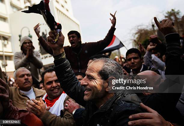 Anti-government protesters demonstrate near the Egyptian Parliament building on February 9, 2011 in Cairo, Egypt. Thousands of Egyptians protested...