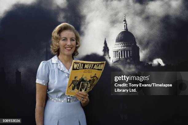 Singer and actress Vera Lynn, 'The Forces' Sweetheart', posing with the score for 'We'll Meet Again', 1972.