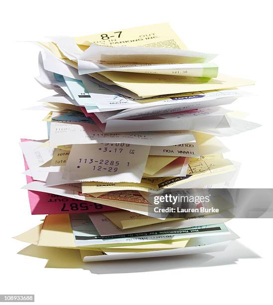 stack of receipts - stack of receipts stock pictures, royalty-free photos & images