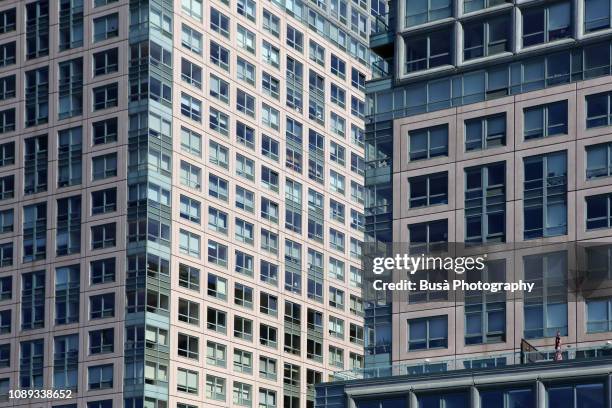 close-up of brand new residential towers along the queens waterfront. new york city, usa - long island city stock pictures, royalty-free photos & images