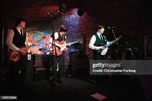 Tribute band the Mersey Beatles play on the stage of the famous Cavern Club on the 50th anniversary of the first time The Beatles played at the...