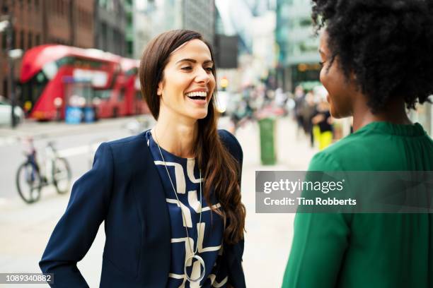 two women talking and laughing together - london 2018 day 2 bildbanksfoton och bilder