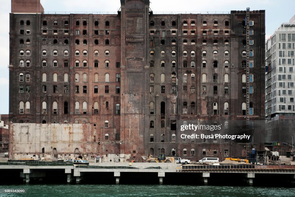 Facade of the old Domino Sugar factory in 2017. Brooklyn, New York City, USA