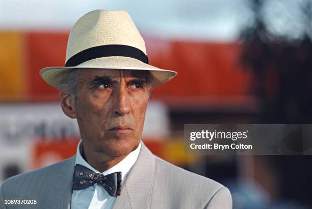 British actor Sir Christopher Lee , stands on a Norfolk beach during a break in filming for an American Television series in Hemsby, Norfolk, U.K.,...