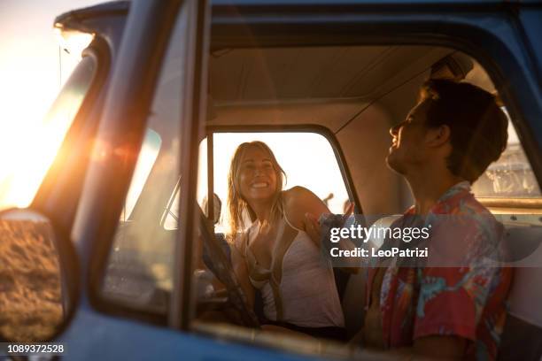 friends enjoying a road trip together in the wild california - take a vintage summer road trip stock pictures, royalty-free photos & images
