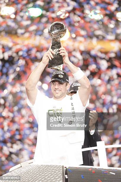 Super Bowl XLV: Green Bay Packers QB Aaron Rodgers victorious with Vince Lombardi trophy after winning game vs Pittsburgh Steelers at Cowboys...