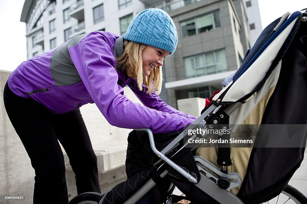 Woman having fun with your young child.
