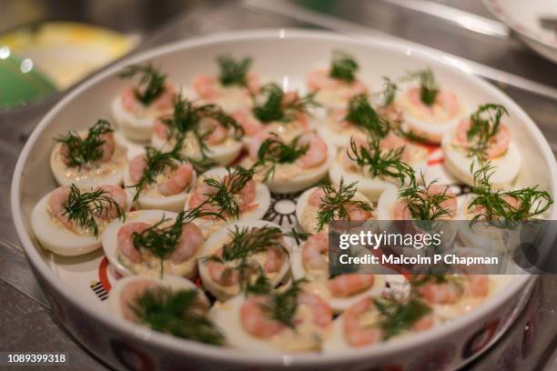 egg haves with prawn and dill on swedish christmas table - swedish culture imagens e fotografias de stock