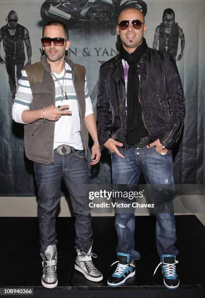 Llandel Veguilla and Juan Luis Morera of Wisin Y Yandel attend a photocall to promote their new album "Los Vaqueros El Regreso Deluxe Edition" at...