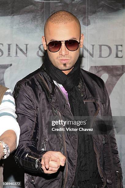 Singer Juan Luis Morera of Wisin Y Yandel attends a photocall to promote Wisin Y Yandel new album "Los Vaqueros El Regreso Deluxe Edition" at Hotel W...