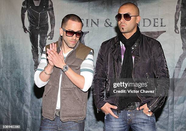 Llandel Veguilla and Juan Luis Morera of Wisin Y Yandel attend a photocall to promote their new album "Los Vaqueros El Regreso Deluxe Edition" at...