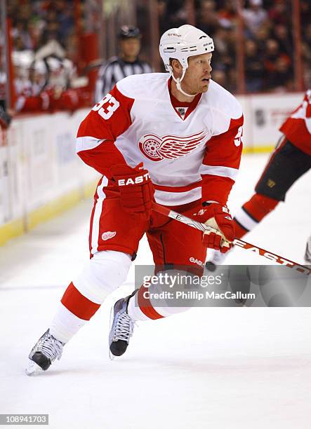 Johan Franzen of the Detroit Red Wings skates hard into the offensive zone in a game against the Ottawa Senators at Scotiabank Place on February 2,...