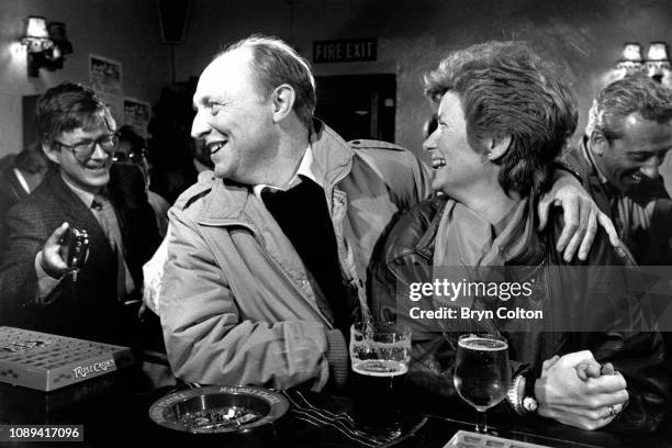 Neil Kinnock, leader of the Labour Party and member of Parliament, and his wife Glenys Kinnock, stop for drinks in a public house during the 1987...