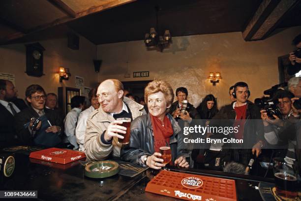 Neil Kinnock, leader of the Labour Party and member of Parliament, and his wife Glenys Kinnock, stop for drinks in a public house during the 1987...
