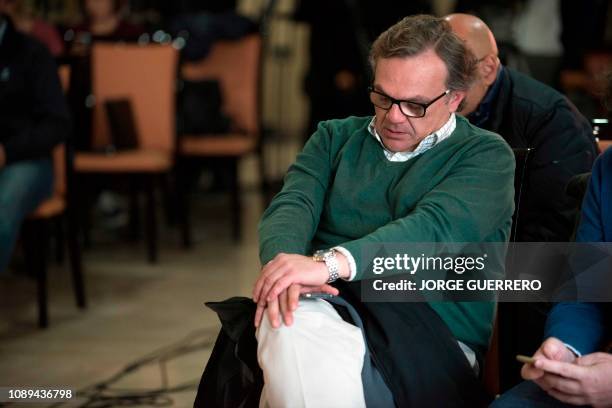 Angel Garcia, delegate of Malaga's civil engineers gestures as he attends a press conference a press conference in Cala del Moral, near Malaga on...