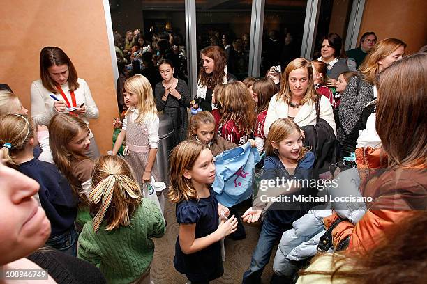 Professional soccer player Heather O'Reilly signs autographs during the HBO Documentary Screening of "Kick Like A Girl" at HBO Building on November...