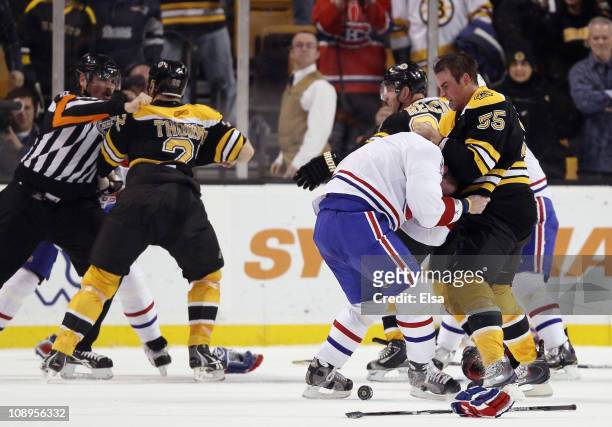 Johnny Boychuk of the Boston Bruins fights with Jaroslav Spacek of the Montreal Canadiens is Shawn Thornton of the Bruins and Brian Gionta of the...