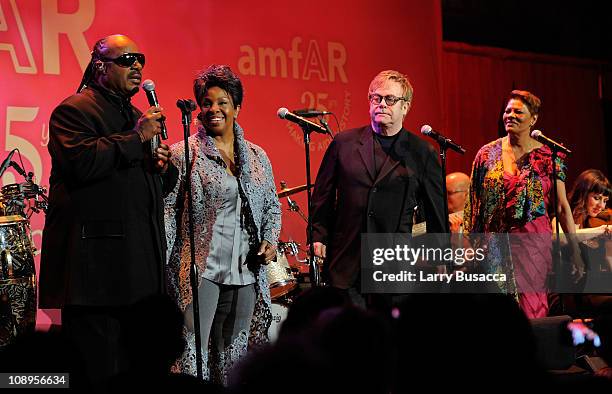 Stevie Wonder, Gladys Knight, Elton John and Dionne Warwick perform "That's What Friends Are For" at the amfAR New York Gala to kick off Fall 2011...