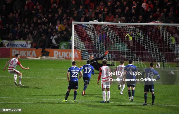 Benjamin Whiteman of Doncaster Rovers scores a penalty for his team's second goal during the FA Cup Fourth Round match between Doncaster Rovers and...