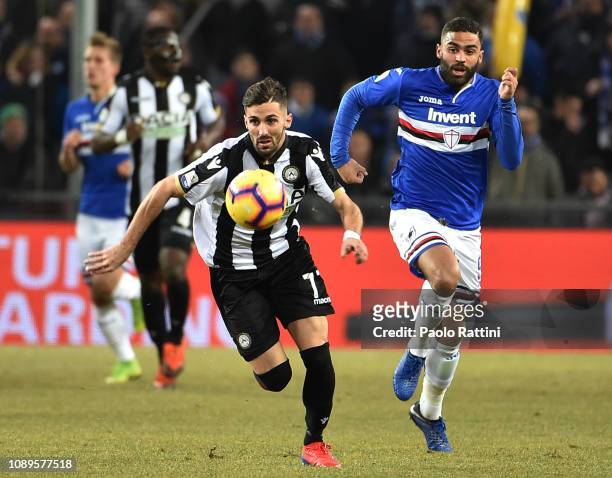 Marco D'Alessandro of Udinese and Gregoire Defrel of Sampdoria in action during the Serie A match between UC Sampdoria and Udinese at Stadio Luigi...