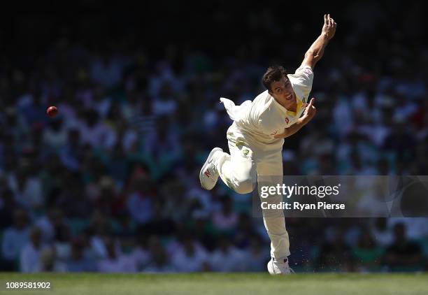 Pat Cummins of Australia bowls during day two of the Fourth Test match in the series between Australia and India at Sydney Cricket Ground on January...