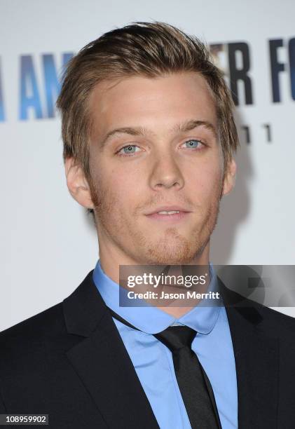 Actor Jake Abel arrives at the premiere of DreamWorks Pictures' 'I Am Number Four' at Village Theatre on February 9, 2011 in Westwood, California.