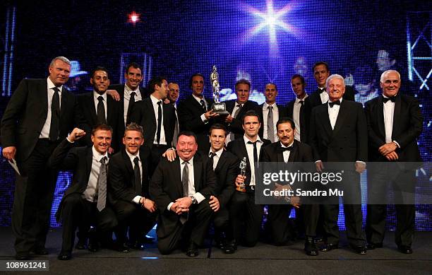 The All Whites team pose with presenters Corporal Willie Apiata and Rob Waddell after winning the Supreme award during the Westpac Halberg Awards at...