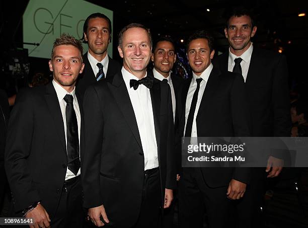 New Zealand Prime Minister John Key poses with David Muligan, Ivan Vicelich, Leo Bertos, Jeremy Christie and James Bannatyne of the All Whites team...