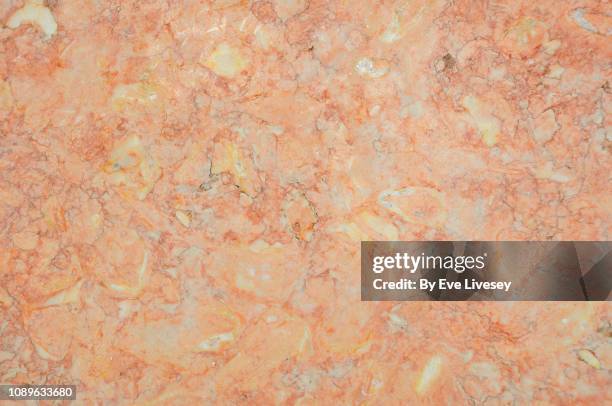 orange marble texture - smooth stones stock pictures, royalty-free photos & images