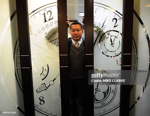 Lifestyle-luxury-HongKong-watches,FEATURE by Adrian AddisonThis photo taken on January 21, 2011 shows watch expert Genki Sakamoto at the Antiquorum...