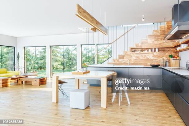 open plan modern kitchen and living room - big living room imagens e fotografias de stock