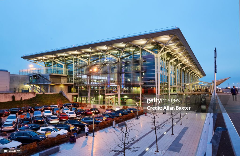 Facade of the 'Euro airport' in Basel illuminated at dusk