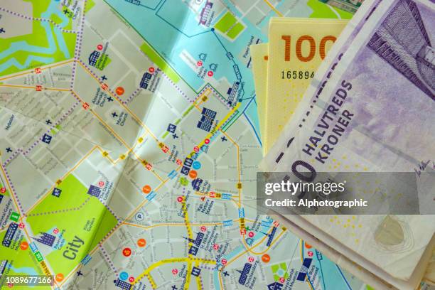 danish currency and copenhagen map - danish money stock pictures, royalty-free photos & images
