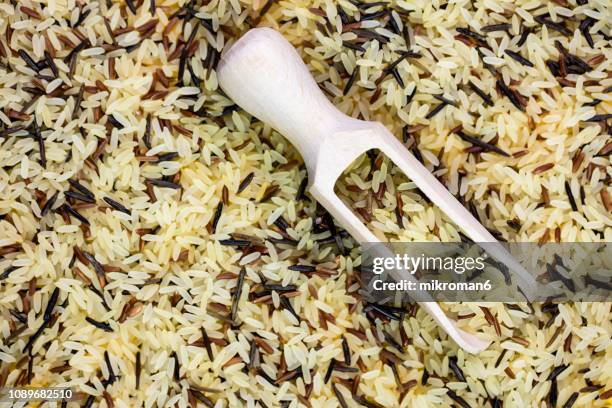 black, white and red rice directly above view, macro shot. traditional food. - national diet of japan stock pictures, royalty-free photos & images